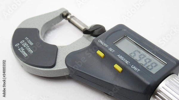Fototapeta A isolated micrometer with a digital display,Located on white background,Easy to use in any work