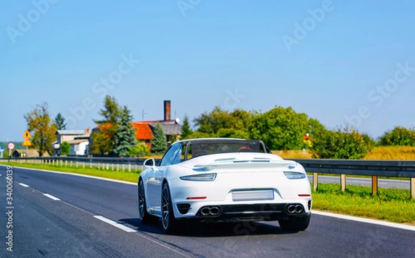 Fototapeta Cabriolet Car on Road in Slovenia reflex