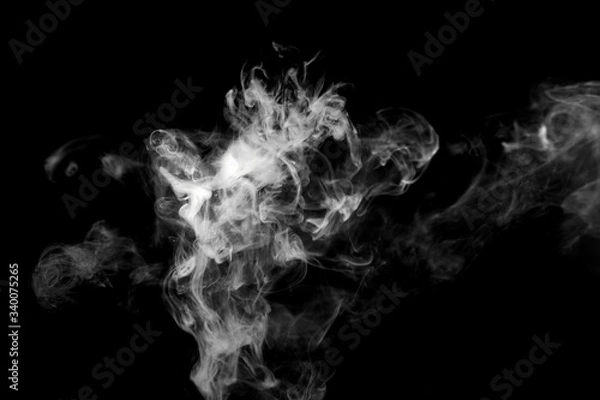 Obraz White isolated smoke on black background