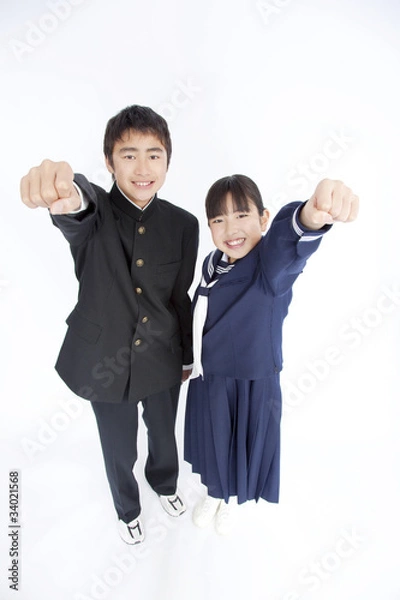 Fototapeta ガッツポーズをする中学生男女