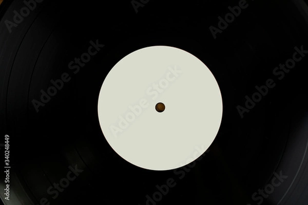 Obraz Close up shot of a black vinyl disk with white tag for mockup purposes