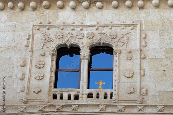 Fototapeta Close-up of two windows of the House of the Inquisition (Casa De La Inquisicion) in Alhama de Granada, Spain, Europe
