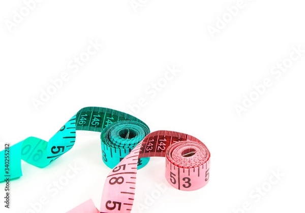 Fototapeta Two measuring tape isolated on white background