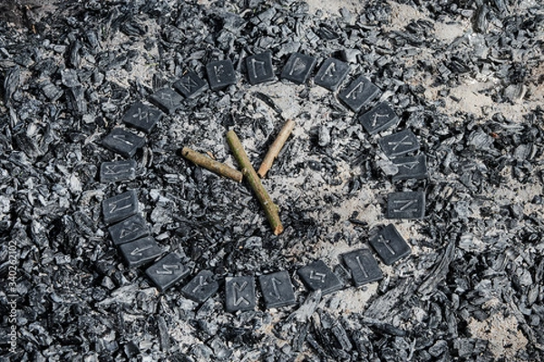 Fototapeta Norse rune Algiz on ashes backgorund inside the circle of 24 Norse runes.