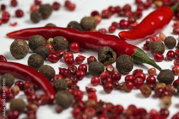 Obraz Res  Pepper on  a white background.