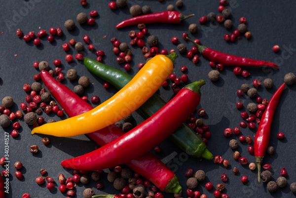 Obraz Pepper on  a black background.