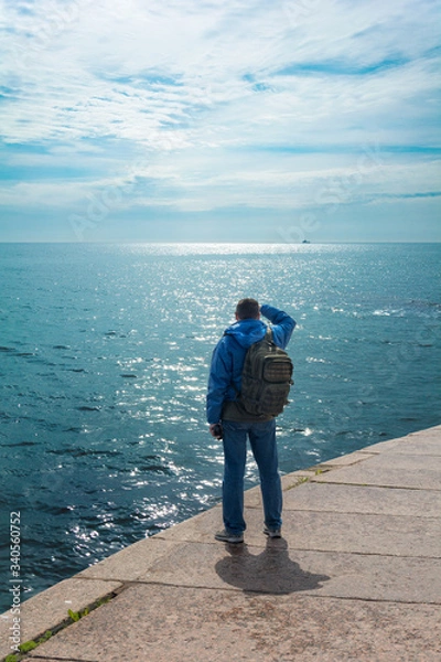 Obraz Hiker man on a picturesque landscape.