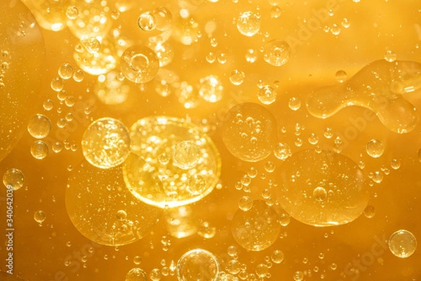 Obraz golden yellow bubble oil droplet, abstract background