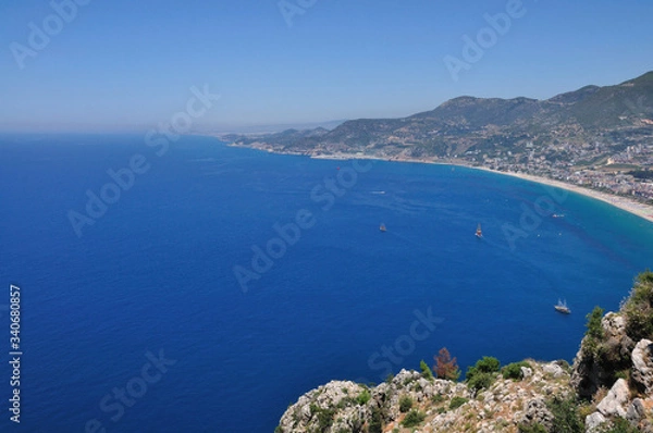 Fototapeta Beautiful sea views and ships from the high mountain. On the horizon, the sea merges with the sky.