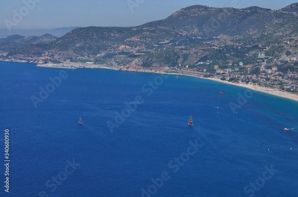 Fototapeta View of the sea bay and ships from the high hill. Beautiful sea landscape on a clear summer day.