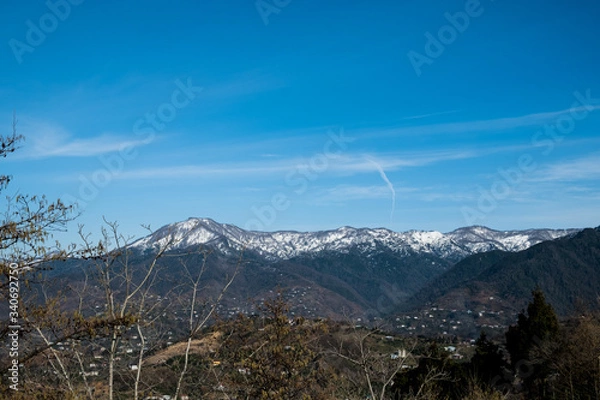 Fototapeta mountains and clouds