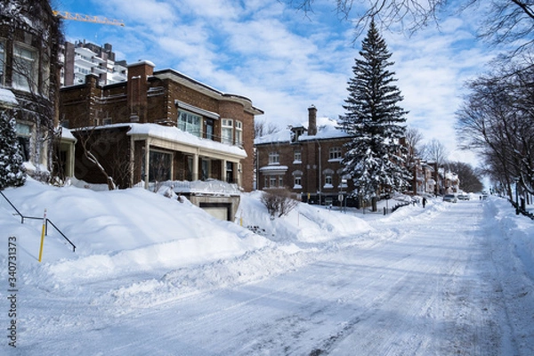 Obraz Houses and street covered with lot of snow in Canada
