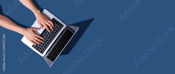 Obraz Person using a laptop computer from above