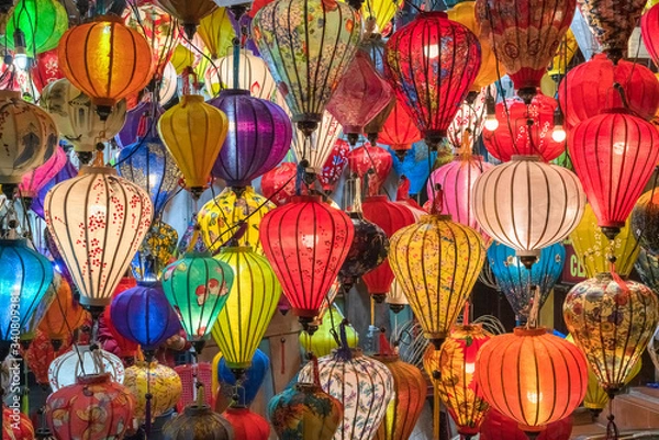 Fototapeta Colorful lanterns spread light on the old street of Hoi An Ancient Town - UNESCO World Heritage Site. Vietnam.