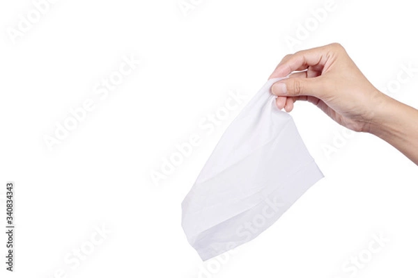 Obraz Hand holding tissue paper isolated on white background