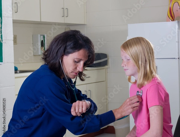 Obraz Nurse with Stethoscope checking student patient