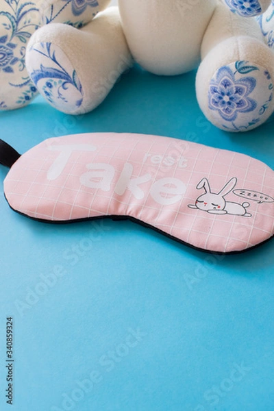 Obraz sleep mask on a blue background
