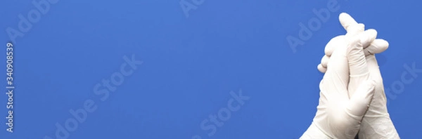 Obraz Doctor's hands on the light blue board