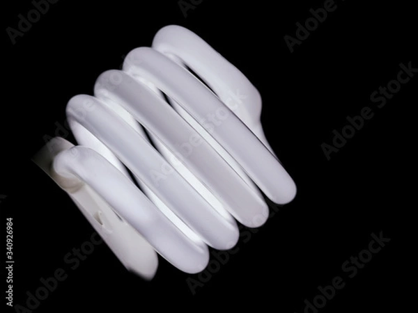 Obraz Close up, Coiled fluorescent light bulb