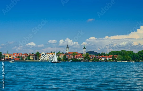 Obraz Lindau embankment on a Sunny day. Boats on lake Constance. Germany. Soft focus, blurry background.
