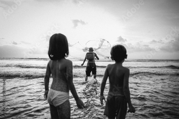 Obraz Kids watching the fisherman