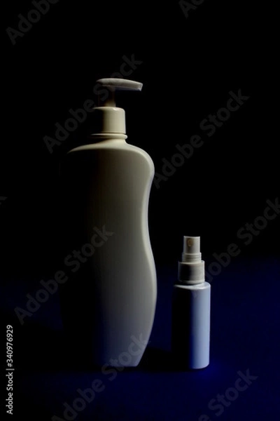 Obraz Spray disinfectants and gel for white hands against the virus