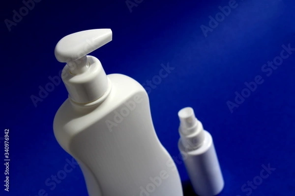 Obraz Spray disinfectants and gel for white hands against the virus