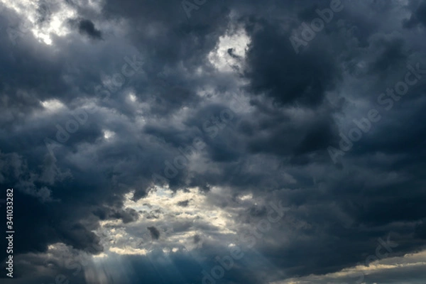 Obraz Dramatic dark sky and clouds. Cloudy sky background. Black sky before thunder storm and rain. 