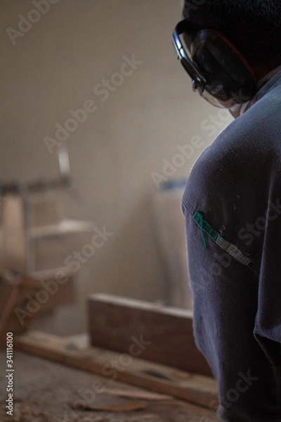 Obraz Carpenter working in his workshop