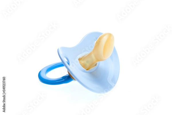 Obraz a blue pacifier made of soft silicone  isolated on white background side view, nobody.