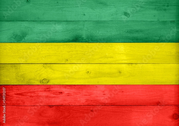 Obraz Wooden surface texture background in rasta colors