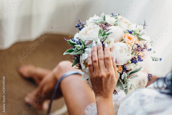 Obraz bride holding wedding bouquet