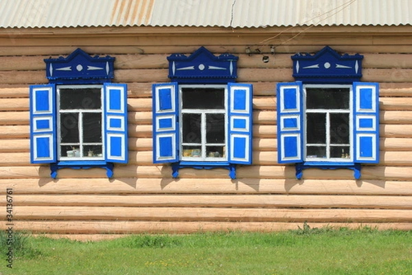 Obraz Фрагмент деревянного дома со ставнями