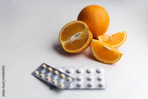 Obraz oranges and vitamins tablets pills