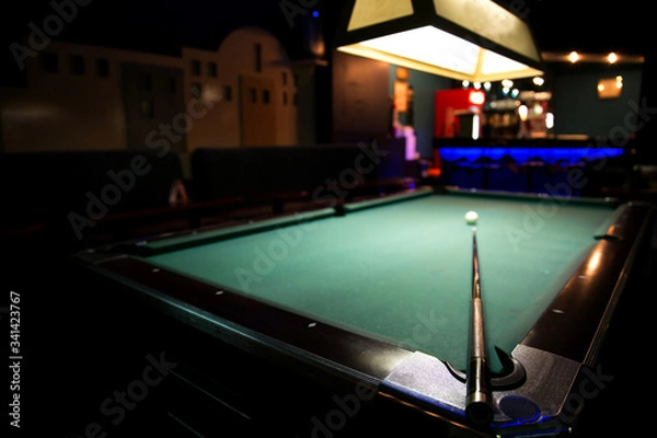 Fototapeta Billiard table with cue