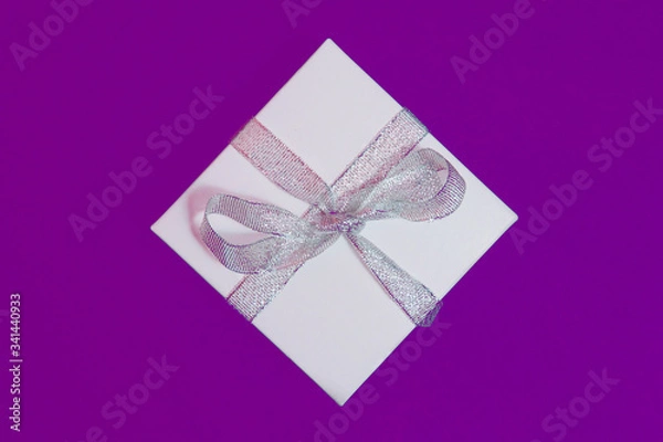 Obraz White gift boxes on a colorful background