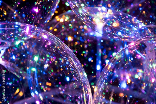 Obraz Crystal clear and transparent balloons with led colourful light inside sparkling and shining in the dark.