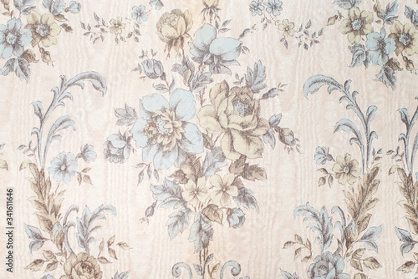 Fototapeta Old vintage wallpaper on the wall with a pattern of flowers