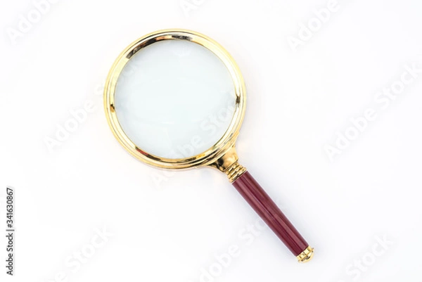 Fototapeta Maroon handle and golden rim Magnifying glass on a white background
