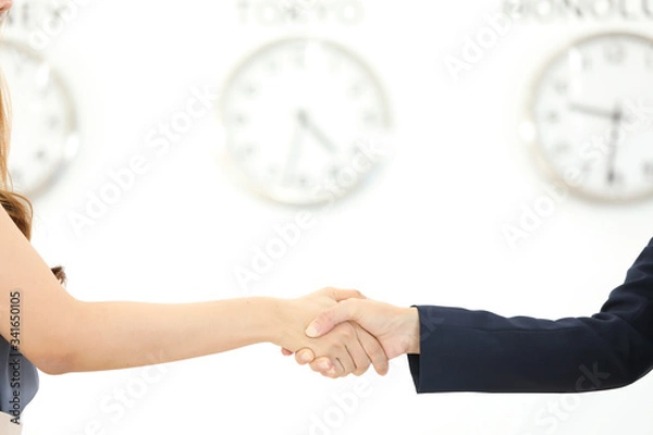 Obraz businessman and businesswoman holding clock