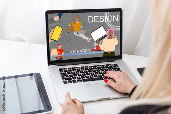 Fototapeta Young successful positive stylish woman freelancer is working on a laptop. Work from apartment remote online. Home office comfortable atmosphere. business internet programmer designer developer