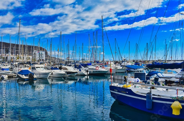 Fototapeta Boats on a row in the harbor.