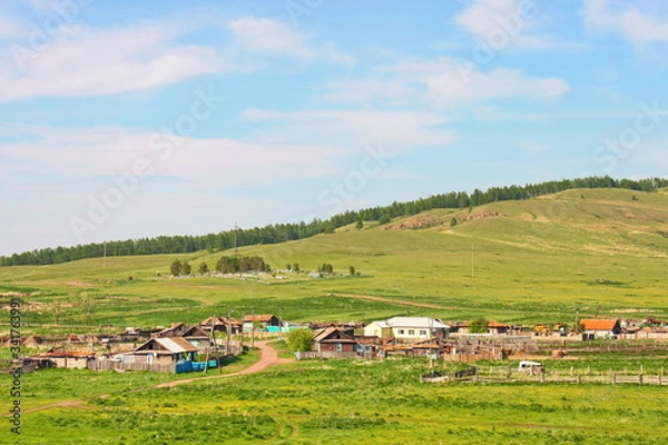 Fototapeta A view of a typical village in the north of the European part of Russia