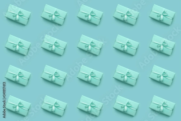 Obraz Many turquoise gift boxes on color background