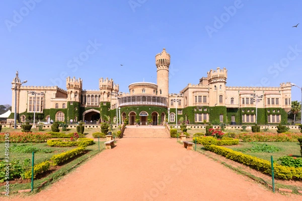Obraz Beautiful exterior view of Bangalore Palace with a garden in front.