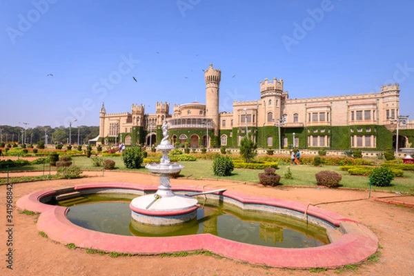 Obraz Beautiful exterior view of Bangalore Palace with a garden in front.