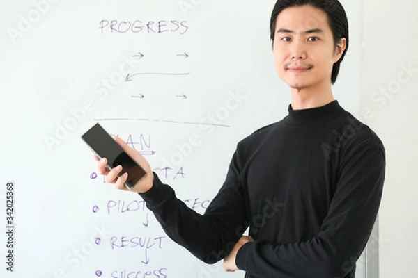 Obraz businessman presenting his project with tablet