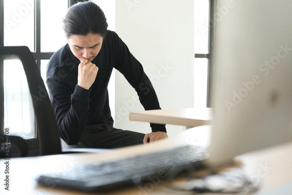 Fototapeta young designer working on computer