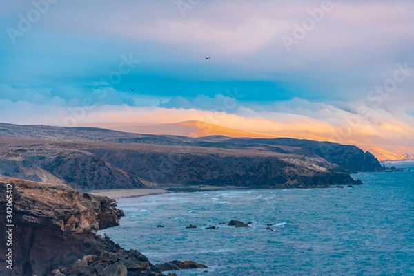 Fototapeta ocean sunset on the cliff