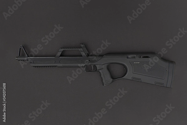 Obraz gun on black background